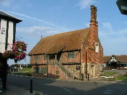 Timber-framed Moot Hall with brick chimney at Market Cross Place in Aldeburgh.