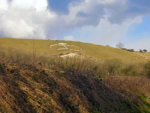 A large white chalk crown design on a grassy hillside near Wye in Kent.