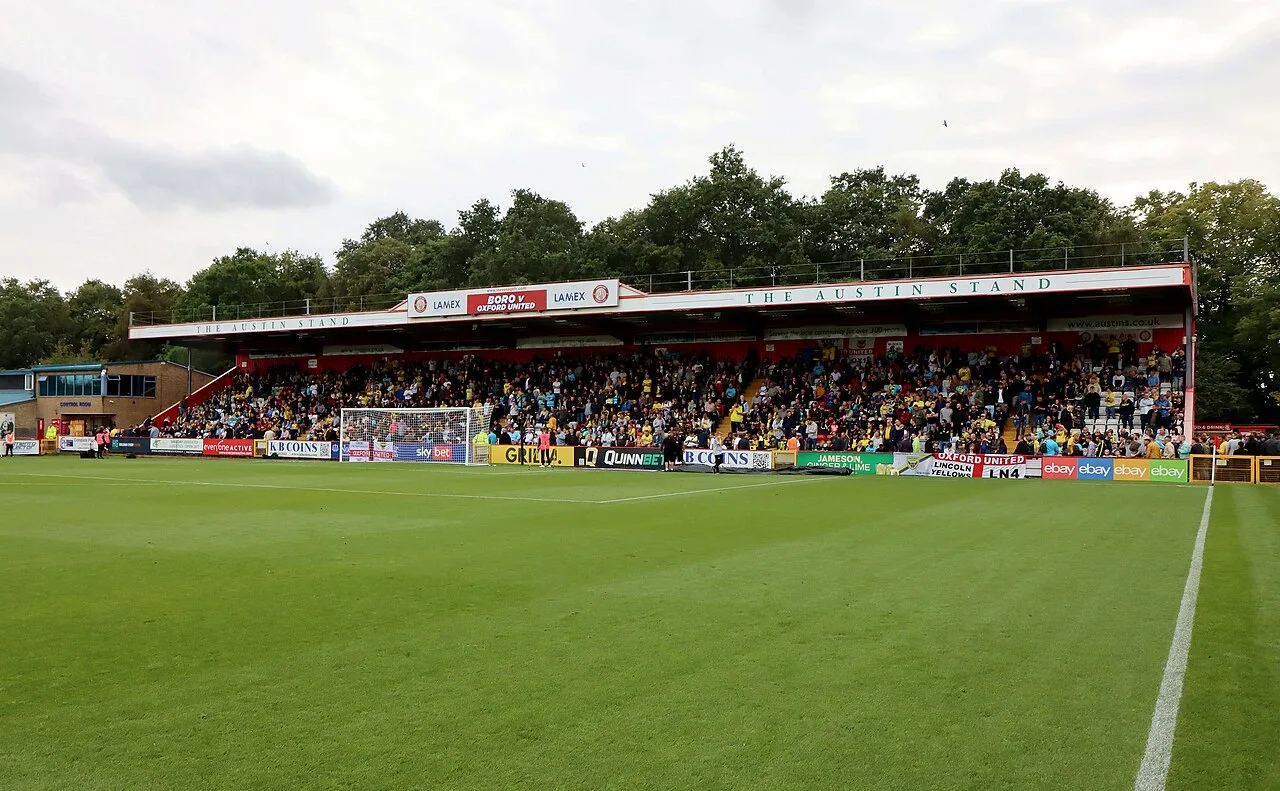 View of the South Stand at the Lamex Stadium with spectators.