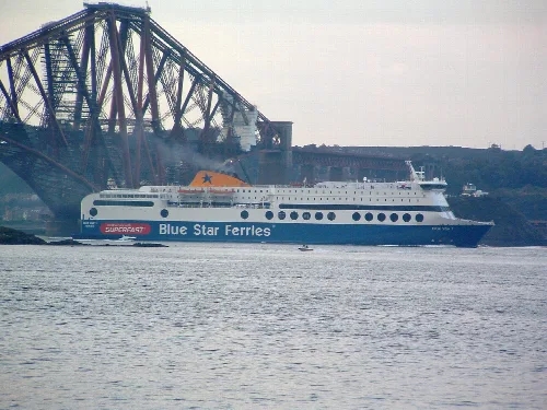 Ferry Blue Star 1 passing under the Forth Bridge.