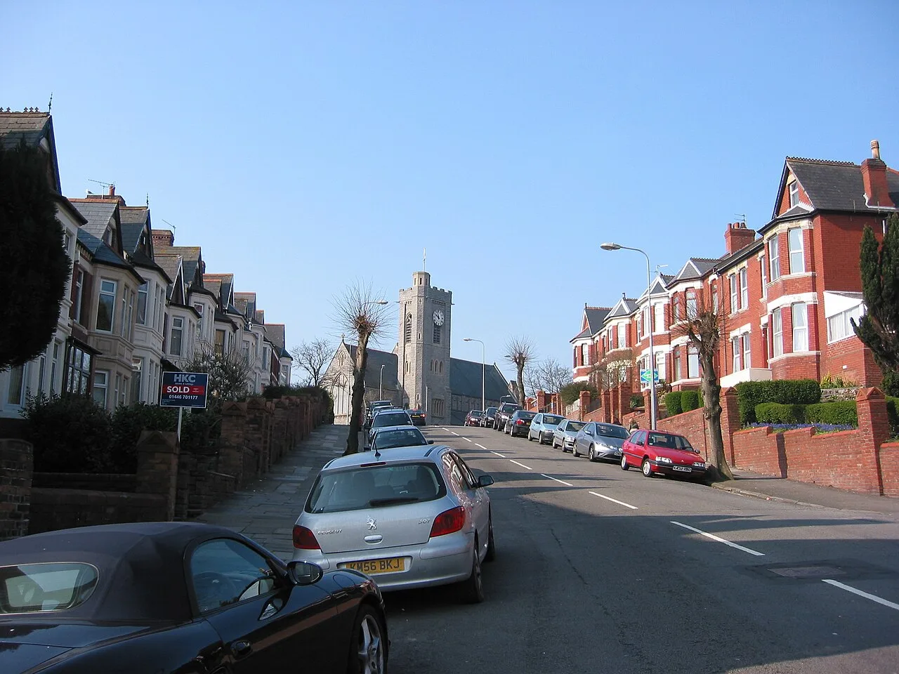 Street view of Barry with All Saints Church at the top of the hill.