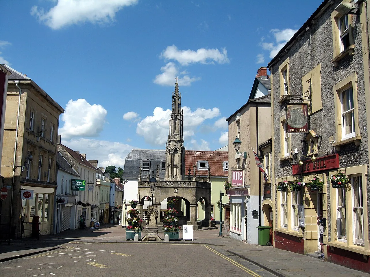 Empty street with market cross and historic buildings in Shepton Mallet.