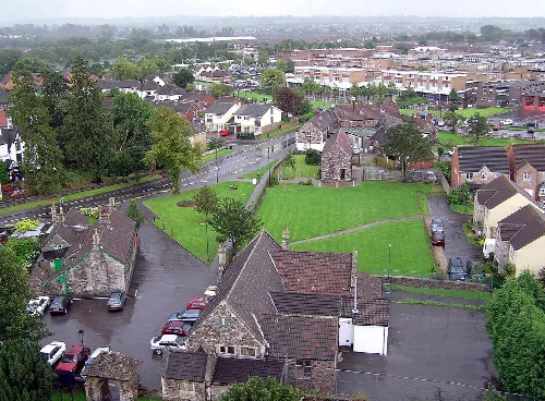 Church, park, and houses in Yate, Gloucestershire.